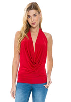 Dare 2 Style Top in red with deep neckline and draped front, showcasing a bold and modern fashion statement.