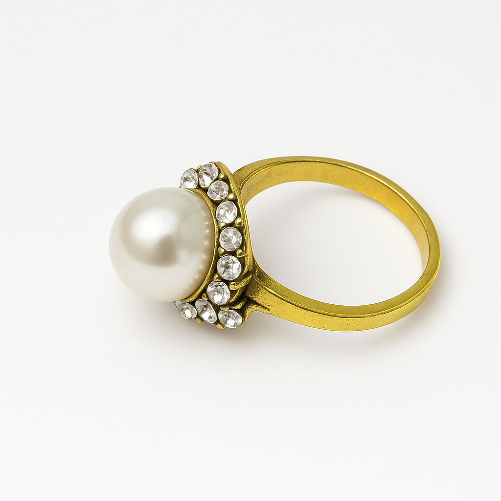 Vintage Pearl Halo Ring featuring a lustrous pearl and sparkling crystals in a gold-toned stainless steel setting.