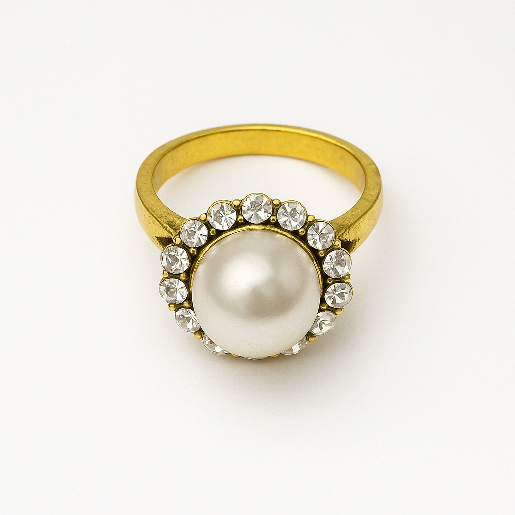 Vintage Pearl Halo Ring featuring a central pearl surrounded by sparkling crystals and a gold-toned band.