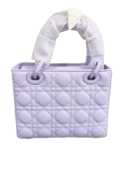 Lumivelle handbag in Lumen Lavender with GeoQuilt texture and structured frame.